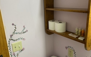 View of bath shelf in room # 1